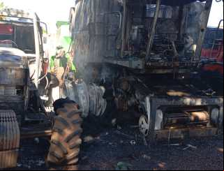Fogo atinge trator e colheitadeira em pátio particular em Planura